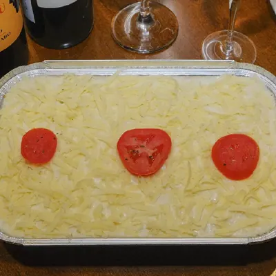Travessa de massa gratinada para levar